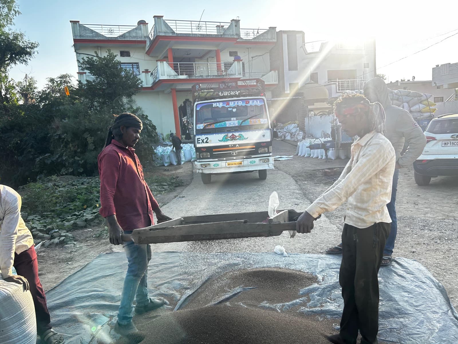 Winnowing the millet harvest before aggregation